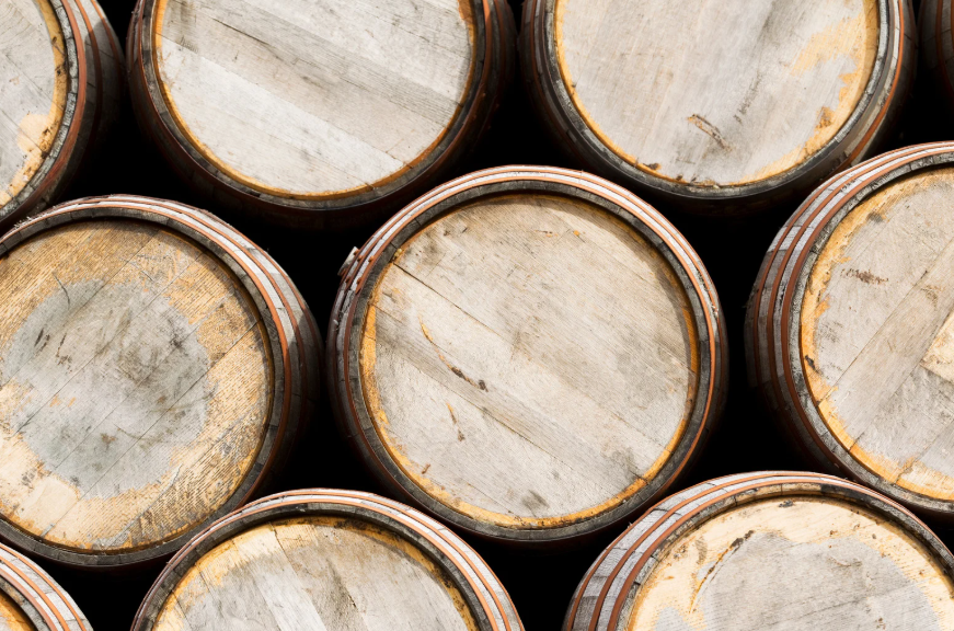 stacked whiskey barrels
